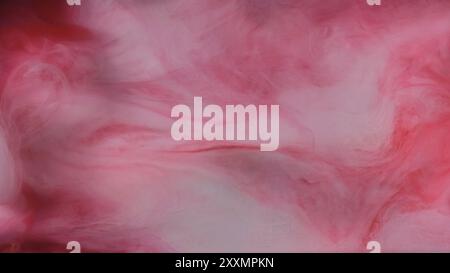 Mist cloud. Paint water blend. Defocused pink red color dust particles texture smog wave on dark abstract art background. Stock Photo