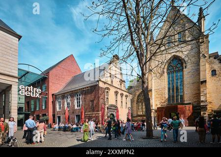 Maastricht, Netherlands - April 13, 2024: Entrance square of famous book store Dominicanen, former medieval church Stock Photo