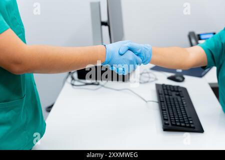 Healthcare team working in hospital office or clinic with other doctors or nurses. Collaboration between health professionals Stock Photo