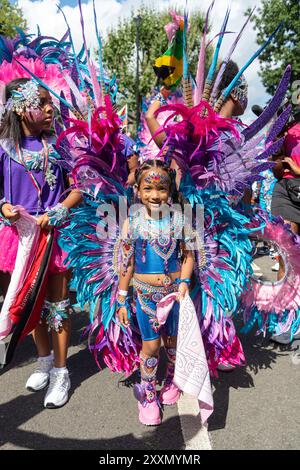 London, UK, 25 August, 2024. Revellers take part in the Notting Hill Carnival in central London. Europe's largest street festival celebrates Caribbean culture and is expected to welcome over 1 million people each day. Photo by Ray Tang Credit: A.A. Gill/Alamy Live News Stock Photo