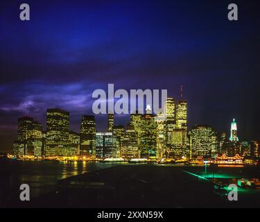 New York 1990s, illuminated lower Manhattan skyline, WTC World Trade Center twin towers, night , New York City, NYC, NY, New York state, USA, Stock Photo