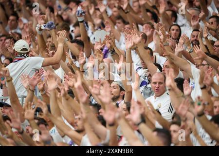 Madrid, Spain. 25th Aug, 2024. MADRID, SPAIN - AUGUST 26: Fans of Real Madrid during the LaLiga EA Sports match between Real Madrid and Real Valladolid at Santiago Bernabeu Stadium on August 25, 2024 in Madrid, Spain. (Photo by Francisco Macia/Photo Players Images/Magara Press) Credit: Magara Press SL/Alamy Live News Stock Photo