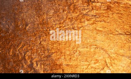 Rough textured metal surface with brushstrokes showing, creating a captivating visual Stock Photo