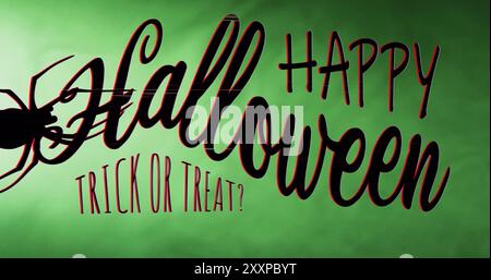 Image of happy halloween text over green smoke on black background Stock Photo