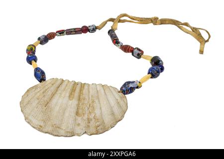 Native American necklace with a large seashell and old glass beads on a leather cord, set free on white Stock Photo