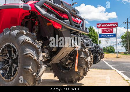 A line of ATVs lined up for sale at a dealership in Corry, Pennsylvania, USA Stock Photo