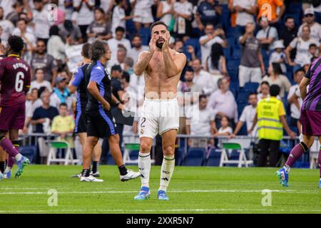 Madrid, Spain. 25th Aug, 2024. Daniel Carvajal applauds the crowd after the match between Real Madrid and Valladolid at the Santiago Bernabeu stadium. Real Madrid defeated Real Valladolid by 3 goals to 0 at the Santiago Bernabeu stadium. The goals were scored by Federico Valverde 49', Brahim Diaz 87', Endrick 95'. Credit: SOPA Images Limited/Alamy Live News Stock Photo