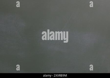 Wall with damaged gray plaster. Concrete wall damaged by weather. Stock Photo