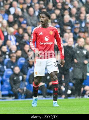 Kobbie Mainoo of Manchester United during the Premier League match between Brighton and Hove Albion and Manchester United at the American Express Stadium  , Brighton , UK - 24th August 2024 Photo Simon Dack / Telephoto Images   Editorial use only. No merchandising. For Football images FA and Premier League restrictions apply inc. no internet/mobile usage without FAPL license - for details contact Football Dataco Stock Photo