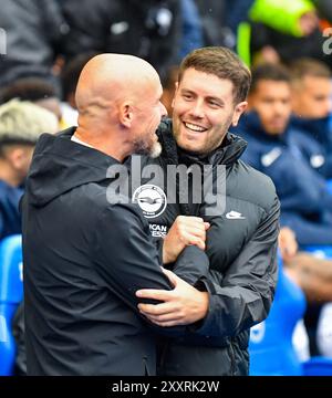 Brighton head coach Fabian Hurzeler with Manchester United manager Erik ten Hag  during the Premier League match between Brighton and Hove Albion and Manchester United at the American Express Stadium  , Brighton , UK - 24th August 2024 Photo Simon Dack / Telephoto Images   Editorial use only. No merchandising. For Football images FA and Premier League restrictions apply inc. no internet/mobile usage without FAPL license - for details contact Football Dataco Stock Photo