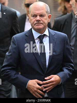 Solingen, Germany. 26th Aug, 2024. Federal Chancellor Olaf Scholz (SPD) on his arrival. A knife attack at the 650th anniversary celebrations of the city of Solingen on August 23rd resulted in deaths and injuries. Credit: Henning Kaiser/dpa-Pool/dpa/Alamy Live News Stock Photo