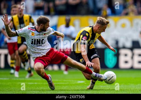 ARNHEM, NETHERLANDS - AUGUST 25: Django Warmerdam of Excelsior Rotterdam and Gyan de Regt of Vitesse battle for possession during the Dutch Keuken Kampioen Divisie match between Vitesse and Excelsior Rotterdam at the Gelredome on August 25, 2024 in Arnhem, Netherlands. (Photo by Rene Nijhuis/Orange Pictures) Stock Photo