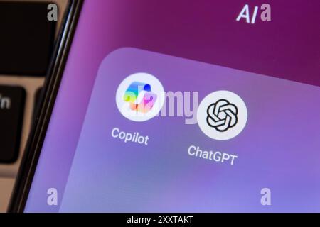 ChatGPT and Microsoft Copilot app logo displayed on smartphone.  Afyonkarahisar, Turkey - July 19, 2024. Stock Photo