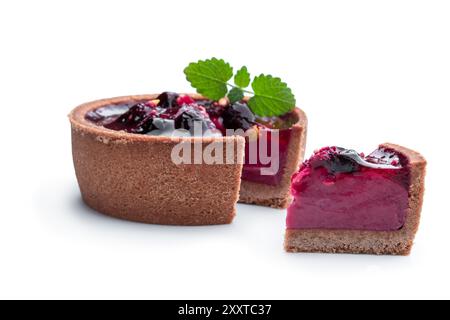 Small  cakes with currant isolated on white Stock Photo
