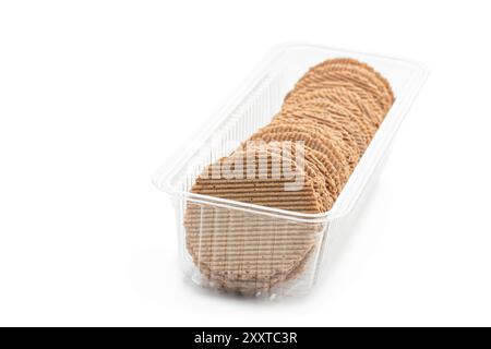 Thin  round rye crispbreads in plastic pack isolated on white Stock Photo