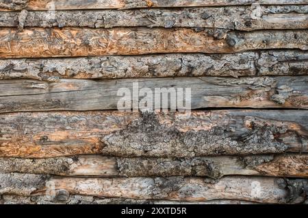 Old wood, boards, cladding with peeling bark. Ornamental texture. Trencin, Slovakia Stock Photo