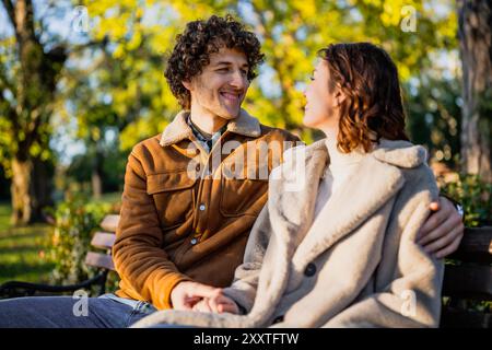 Portrait of happy loving couple in park. Stock Photo