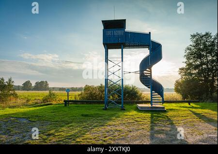 Platform for birdwatching at Soomaa National Park, Estonia. Observation platform in the sunset rays. Stock Photo