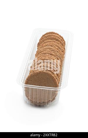 Thin  round rye crispbreads in plastic pack isolated on white Stock Photo