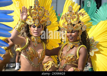 London, UK. 26th Aug, 2024. Revellers take part in the Adult's Day Parade on the Monday of the Notting Hill Carnival in West London UK. The colourful parade is the climax of the annual Carnival is held over the August Bank Holiday weekend. Credit: MARTIN DALTON/Alamy Live News Stock Photo