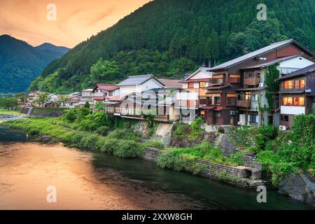 Gujo Hachiman, Japan hot springs town at dusk over the Yoshida River. Stock Photo