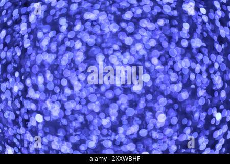 Abstract Blurred Sparkling Vibrant Blue Illuminated Decorative Lights Stock Photo