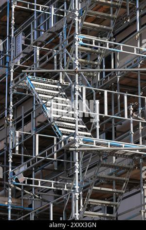 Scaffolding with scaffold staircase on new development site in radcliffe greater manchester uk Stock Photo