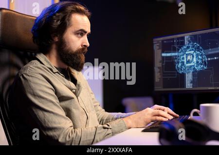 Computer engineer updating artificial intelligence neural networks, writing binary code scripts. Teleworking system administrator upgrading high tech AI in neon illuminated apartment office Stock Photo