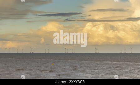 Clouds over wind turbines in the North Sea, seen from Whitstable, Kent, England, UK Stock Photo