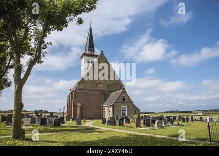 Texel, the Netherlands. August 2021. The old church with cemetery In Den Hoorn at the island of Texel, Holland Stock Photo