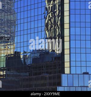 Architectural detail. Glass facade of a skyscraper in Sydney Stock Photo