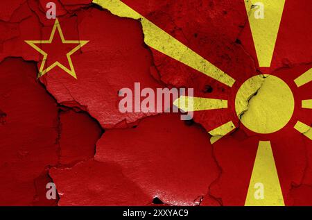 Historical flag of Socialist Republic of Macedonia and today North Macedonia flag painted on cracked wall Stock Photo