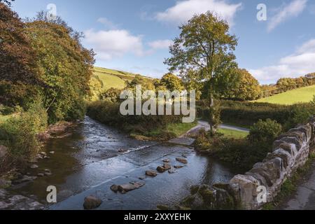 Crossing Badgworthy Water in Malmsmead, Devon, England, UK Stock Photo