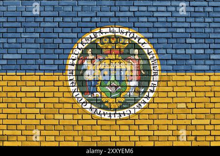 Flag of Pecs painted on brick wall Stock Photo