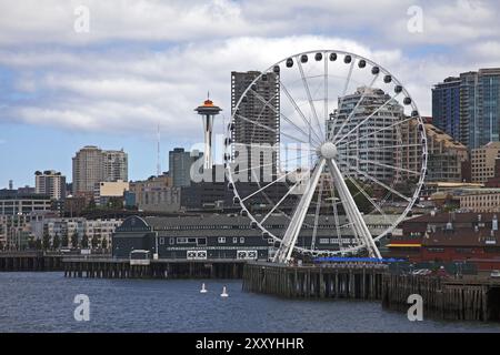 Seattle Waterfront with Space Needle and ferris wheel Stock Photo