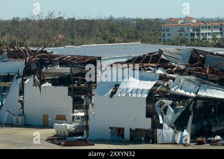 Hurricane Ian destroyed boat station in Florida coastal area. Natural disaster and its consequences. Stock Photo