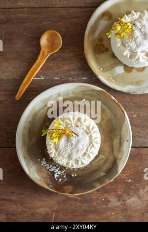homemake coconut cake on wood background Stock Photo