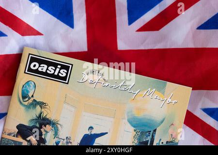 London, UK - August 27 2024: Oasis band cds. Oasis are a popular rock band from the 1990's britpop era. Stock Photo