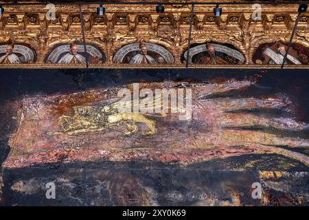 October 12, 2022. Anselm Kiefer's painting series titled These Writings, When Burned, Will Finally Cast a Little Light exibited at Palazzo Ducale in V Stock Photo