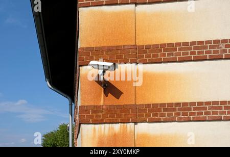Surveillance camera on building with copy space Stock Photo