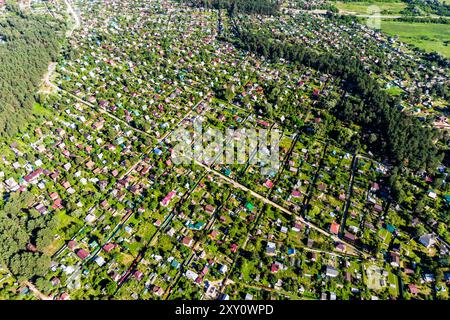 View from a high altitude of a holiday village in the countryside, dense buildings Stock Photo