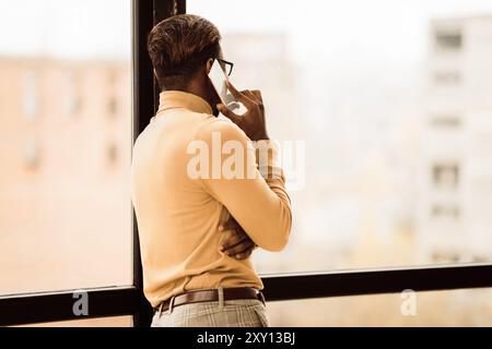 Unrecognizable afro man talking on the phone Stock Photo