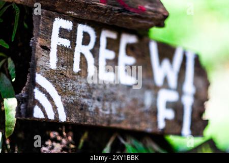 Wooden signboard which announces about free wi-fi, Kathmandu, Nepal Stock Photo
