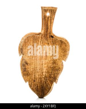Old rustic leaf shaped wooden board isolated on white background. Stock Photo