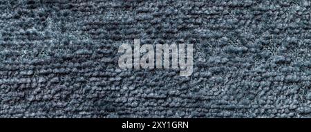 Light blue background from a soft textile material. sheathing fabric with natural texture. Gray cloth backdrop. Stock Photo