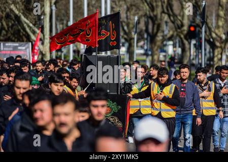 Shia Muslims filled streets during Arbaeen procession. The 16th annual Arbaeen processions is organised by Ashura. Melbourne Shia Muslim community commemorates Arbaeen - 40th day after Ashura, day of death of Imam Hussain, grandson of Prophet Mohammad. The procession marched from Queen Victoria Gardens to Birrarung Marr. Stock Photo