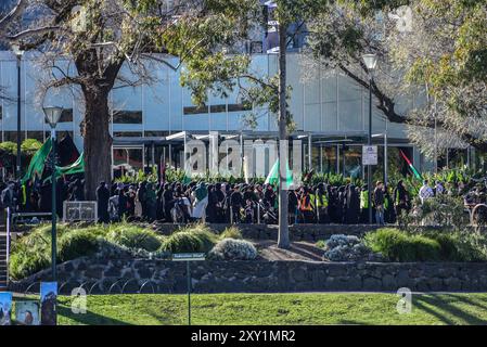 Large numbers of Shia muslims are seen during Arbaeen procession. The 16th annual Arbaeen processions is organised by Ashura. Melbourne Shia Muslim community commemorates Arbaeen - 40th day after Ashura, day of death of Imam Hussain, grandson of Prophet Mohammad. The procession marched from Queen Victoria Gardens to Birrarung Marr. Stock Photo