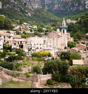 View of the town of Valdemossa nestled in the Serra de Tramuntana mountains on the Spanish island of Majorca Stock Photo