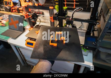 3D printer plate. Plastic objects. Home lab factory Stock Photo