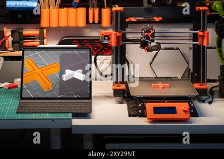 3D print project lab. Home studio. Computer screen with stl object. Stock Photo